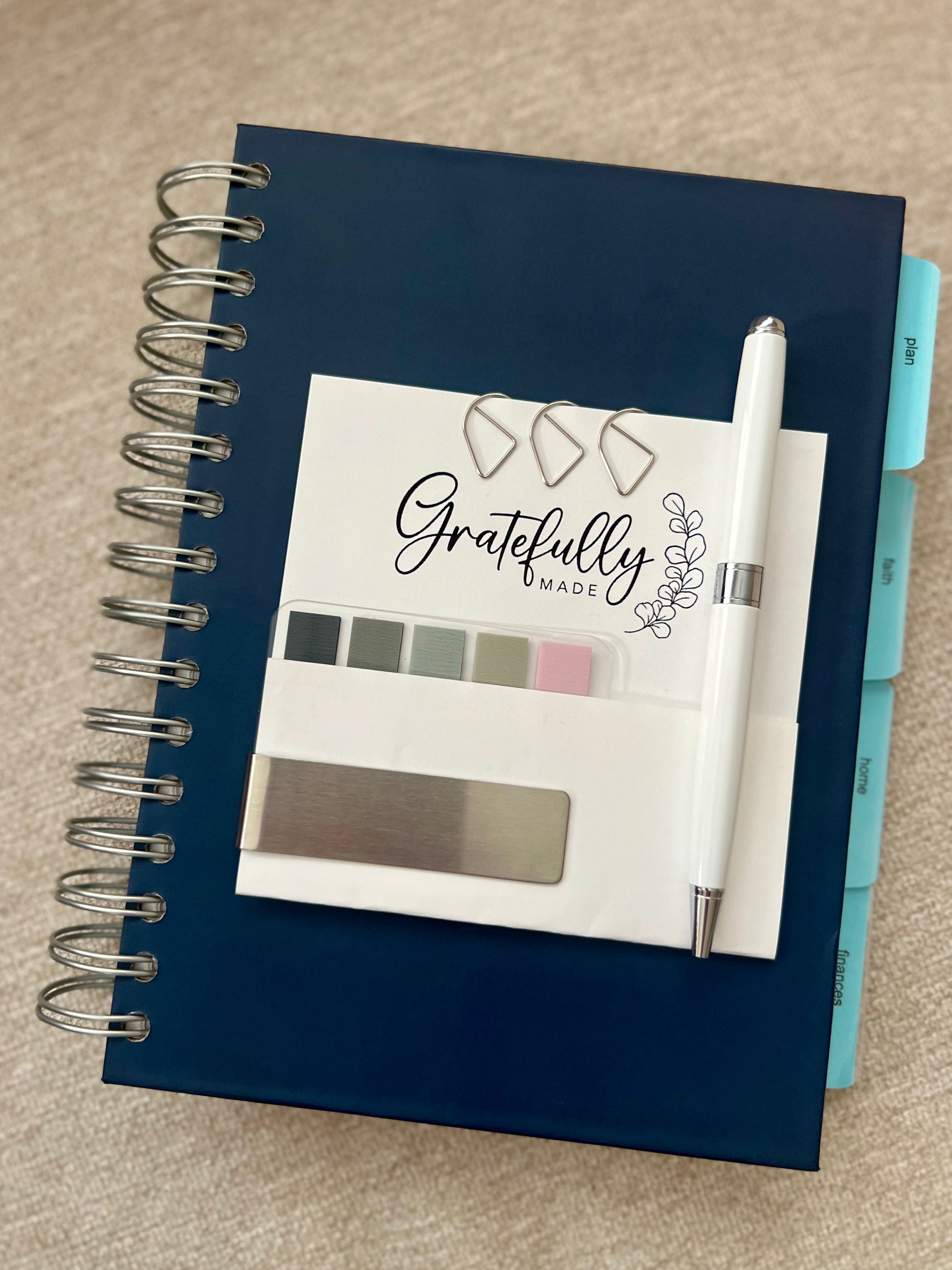 the year - a navy, spiral Orthodox undated life planner with four tabs of resources for organizing your days, keeping your faith close, maintaining your home and knowing where your finances stand - all at your fingertips.
if you preorder, you will receive priority shipping and planner accessories for free.